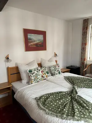 Ein Bett oder Betten in einem Zimmer der Unterkunft Frida Cantina Y Bar I Hotel