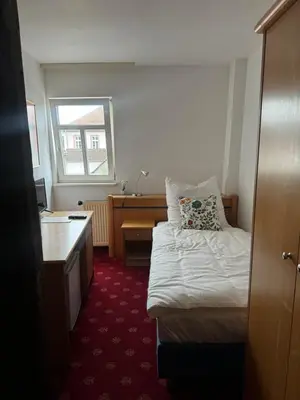 Ein Bett oder Betten in einem Zimmer der Unterkunft Frida Cantina Y Bar I Hotel