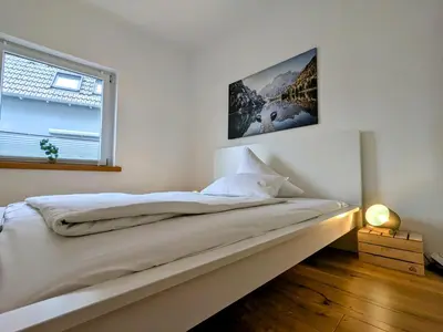Ein Bett oder Betten in einem Zimmer der Unterkunft 55qm Messe Wohnung, Trade Fair, 6 Minuten zur Messe