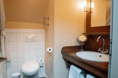 Ein Badezimmer in der Unterkunft Friedrich von Schiller Hotel