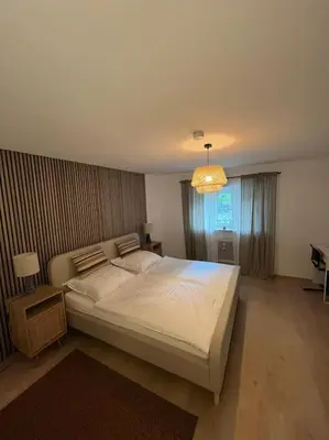 Ein Bett oder Betten in einem Zimmer der Unterkunft Schöne Wohnung Rheinstetten Forchheim Nähe MesseKA