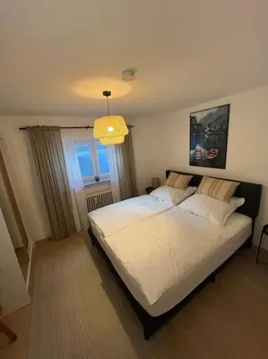 Ein Bett oder Betten in einem Zimmer der Unterkunft Schöne Wohnung Rheinstetten Forchheim Nähe MesseKA