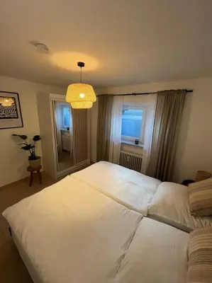 Ein Bett oder Betten in einem Zimmer der Unterkunft Schöne Wohnung Rheinstetten Forchheim Nähe MesseKA