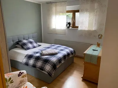 Ein Bett oder Betten in einem Zimmer der Unterkunft Ferienwohnung Meschi