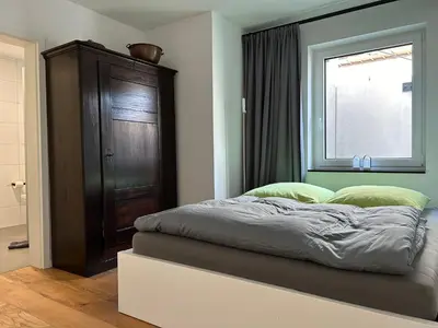 Ein Bett oder Betten in einem Zimmer der Unterkunft Karlsruhe Grünwettersbach