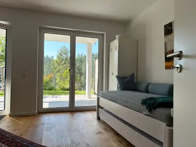 Ein Bett oder Betten in einem Zimmer der Unterkunft Karlsruhe Grünwettersbach