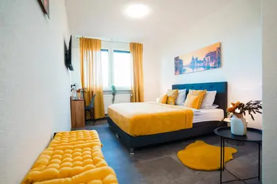 Ein Bett oder Betten in einem Zimmer der Unterkunft Hotel am Schafbaum