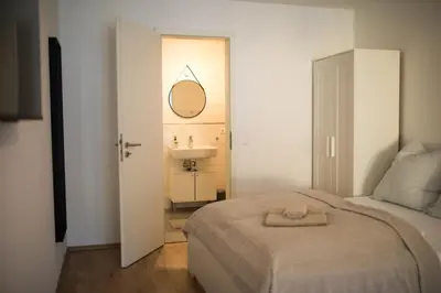 Ein Bett oder Betten in einem Zimmer der Unterkunft HUGOS Studio Apartment