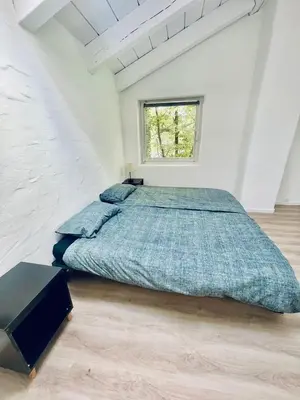Ein Bett oder Betten in einem Zimmer der Unterkunft Penthouse Overlooking the Neckar