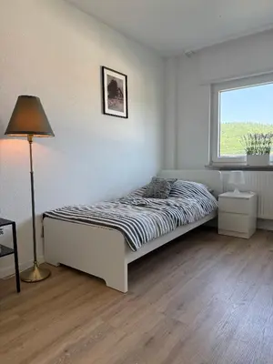 Ein Bett oder Betten in einem Zimmer der Unterkunft Monteur- und Ferienunterkunft Wilhelmsfeld & Heidelberg