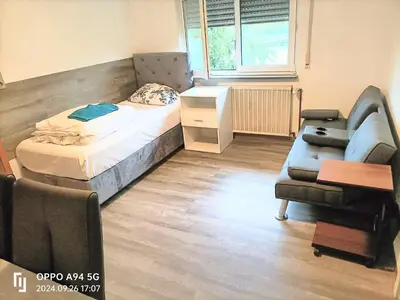 Ein Bett oder Betten in einem Zimmer der Unterkunft Haus66