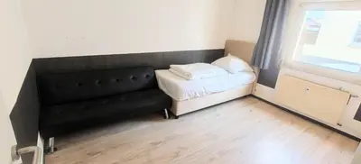 Ein Bett oder Betten in einem Zimmer der Unterkunft Haus66