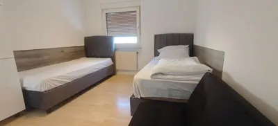 Ein Bett oder Betten in einem Zimmer der Unterkunft Haus66
