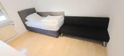 Ein Bett oder Betten in einem Zimmer der Unterkunft Haus66