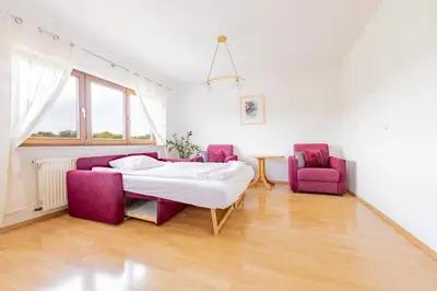 Ein Bett oder Betten in einem Zimmer der Unterkunft Ferienhof Krapf