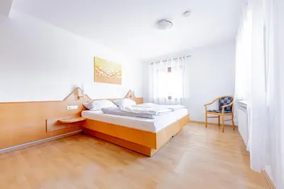 Ein Bett oder Betten in einem Zimmer der Unterkunft Ferienhof Krapf