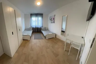 Ein Bett oder Betten in einem Zimmer der Unterkunft Ferienwohnung Marktplatz