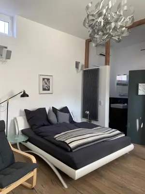 Ein Bett oder Betten in einem Zimmer der Unterkunft Idyllisches Zimmer in Traumlage