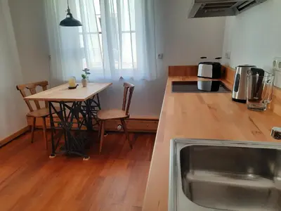 Küche/Küchenzeile in der Unterkunft Heimschneiderei