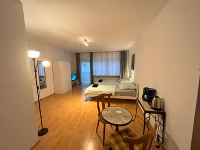 Ein Bett oder Betten in einem Zimmer der Unterkunft Arrive & Relax Darmstadt Whg 3