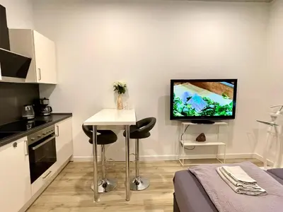 Küche/Küchenzeile in der Unterkunft Goldstadt White Suite - City Apartament Schlössle Pforzheim