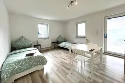 Ein Bett oder Betten in einem Zimmer der Unterkunft Ganze Wohnung - Parkplatz - Wi-fi - Küche - Balkon