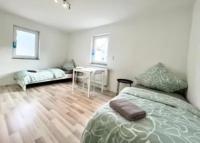 Ein Bett oder Betten in einem Zimmer der Unterkunft Ganze Wohnung - Parkplatz - Wi-fi - Küche - Balkon