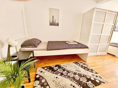 Ein Bett oder Betten in einem Zimmer der Unterkunft Work & Stay Apartment in Biebelnheim