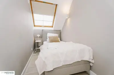 Ein Bett oder Betten in einem Zimmer der Unterkunft Top Apartment im Zentrum - youpartments