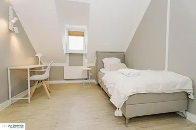 Ein Bett oder Betten in einem Zimmer der Unterkunft Top Apartment im Zentrum - youpartments