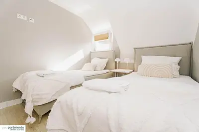 Ein Bett oder Betten in einem Zimmer der Unterkunft Top Apartment im Zentrum - youpartments