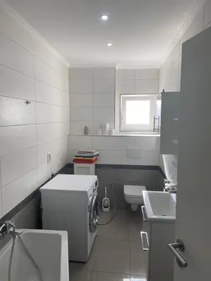 Ein Badezimmer in der Unterkunft Zentrale 3 Zimmerwohnung mit kostenlosem Stellplatz