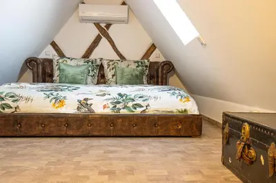 Ein Bett oder Betten in einem Zimmer der Unterkunft Maison Da Silva