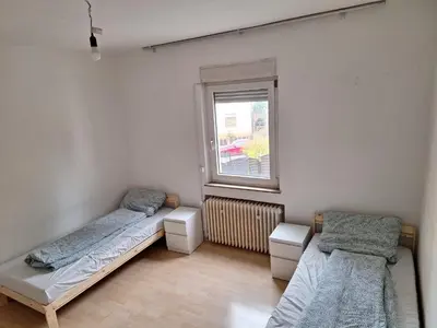 Ein Bett oder Betten in einem Zimmer der Unterkunft Malamin
