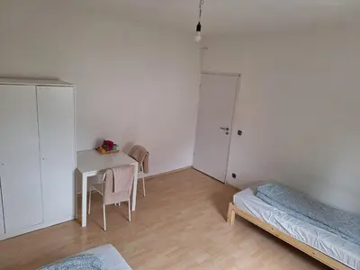 Ein Bett oder Betten in einem Zimmer der Unterkunft Malamin