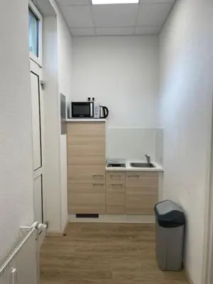 Küche/Küchenzeile in der Unterkunft G- Seestr 9 mit eigener Dusche und WC
