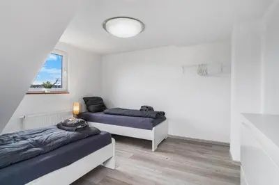 Ein Bett oder Betten in einem Zimmer der Unterkunft BA02 Dachgeschoss Apartment!