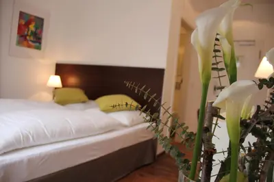 Ein Bett oder Betten in einem Zimmer der Unterkunft Hotel Restaurant Schwan