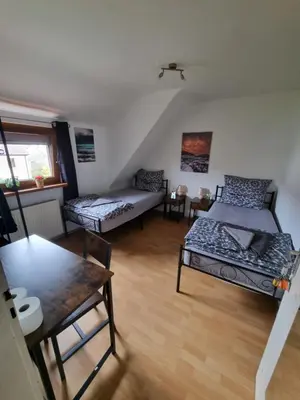 Ein Bett oder Betten in einem Zimmer der Unterkunft Pension Parga