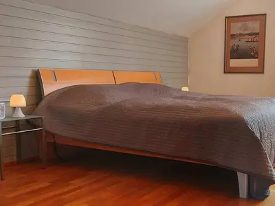 Ein Bett oder Betten in einem Zimmer der Unterkunft Raquet 2 Comfortable holiday residence
