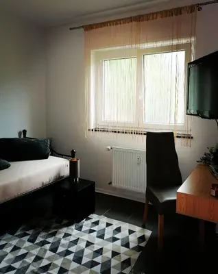 Ein Bett oder Betten in einem Zimmer der Unterkunft Modernes Apartment - Neustadt an der Weinstraße