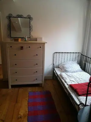 Ein Bett oder Betten in einem Zimmer der Unterkunft Ferienwohnung am Nibelungensteig unter der Burg