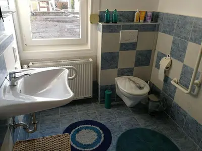 Ein Badezimmer in der Unterkunft Ferienwohnung am Nibelungensteig unter der Burg