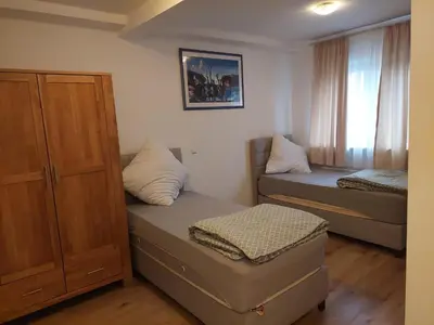 Ein Bett oder Betten in einem Zimmer der Unterkunft Hotel Bruchsal Herz