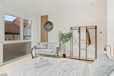 Ein Bett oder Betten in einem Zimmer der Unterkunft CasaVia Frankenthal Zentrum - BRIGHT Collection