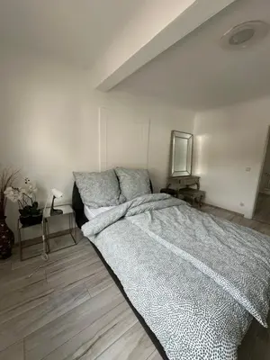 Ein Bett oder Betten in einem Zimmer der Unterkunft Leimen51 Whg1