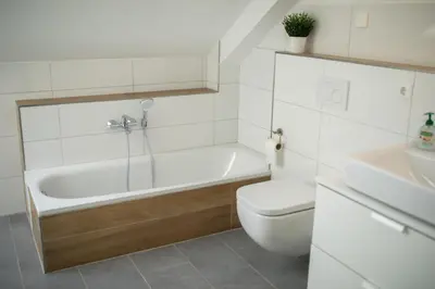 Ein Badezimmer in der Unterkunft HUGOS Design Apartment am Waldrand - ruhig & modern