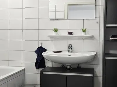 Ein Badezimmer in der Unterkunft City Apartment in Eppelheim near Heidelberg