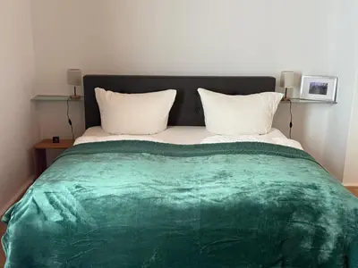 Ein Bett oder Betten in einem Zimmer der Unterkunft Obere Stadtwohnung rechts