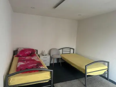 Ein Bett oder Betten in einem Zimmer der Unterkunft Fürsten Zimmer
